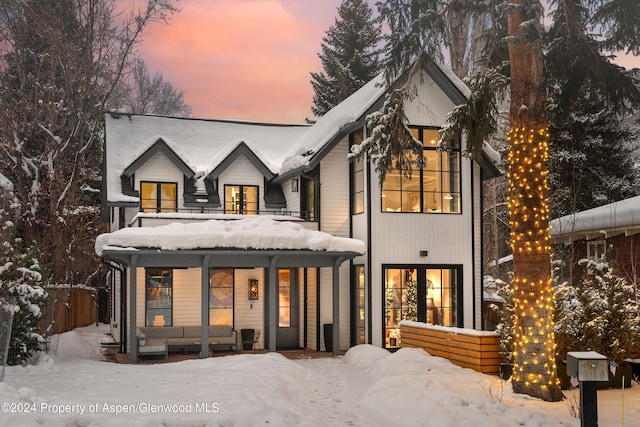 view of snow covered property