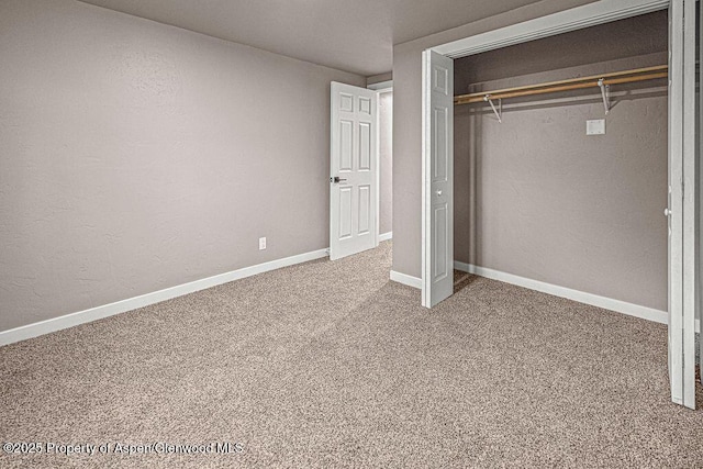 885 Stout St, Craig, CO 81625 - unfurnished bedroom with a closet, carpet floors, and baseboards