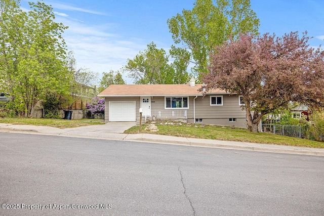 885 Stout St, Craig, CO 81625 - ranch-style house with an attached garage and driveway