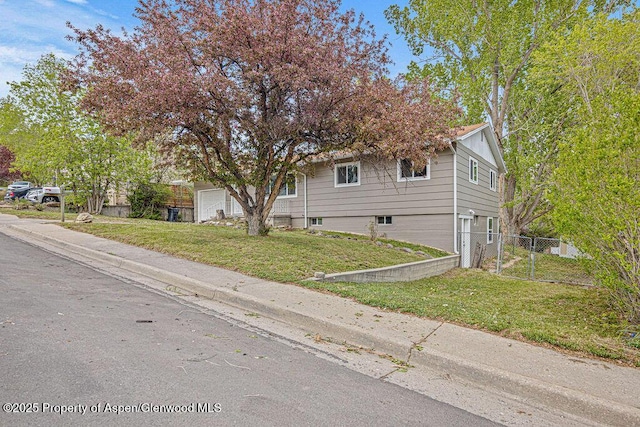 885 Stout St, Craig, CO 81625 - view of front facade with a garage