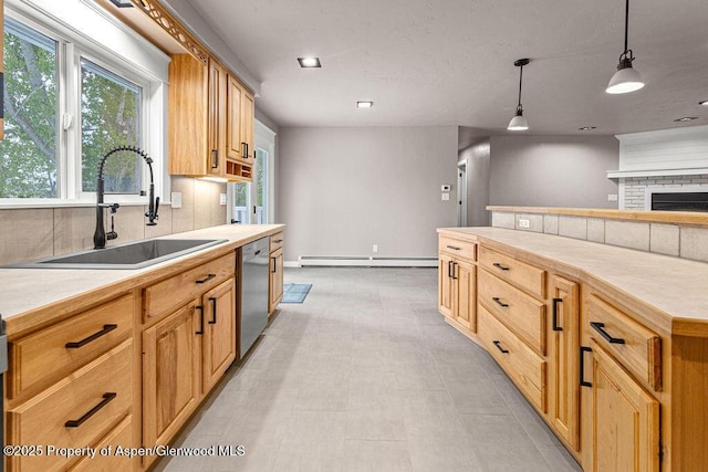 885 Stout St, Craig, CO 81625 - kitchen with a sink, dishwasher, light countertops, and decorative light fixtures