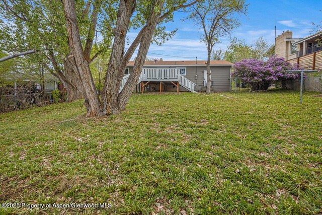 885 Stout St, Craig, CO 81625 - view of yard featuring a deck and stairway