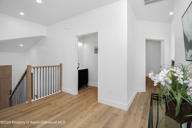 hall featuring light hardwood / wood-style floors