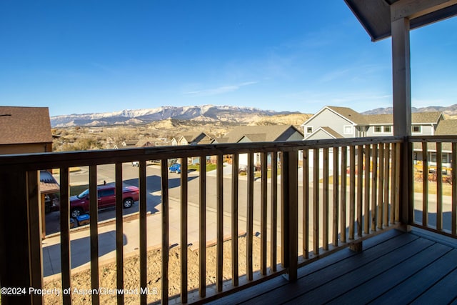 wooden terrace with a mountain view