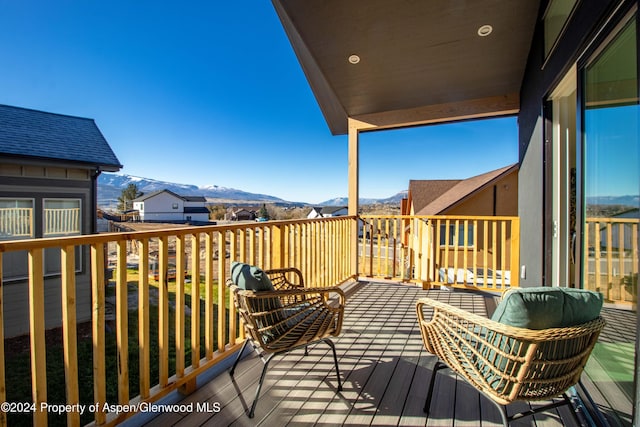 balcony featuring a mountain view