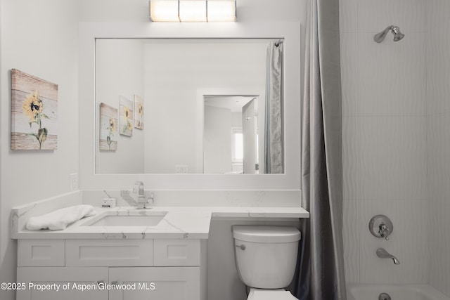 full bathroom with vanity, toilet, and shower / bath combo with shower curtain