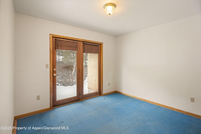 view of carpeted spare room