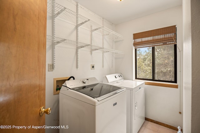 laundry area featuring independent washer and dryer