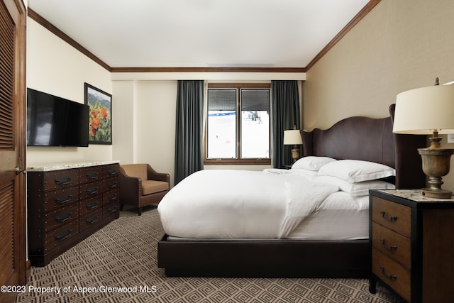 carpeted bedroom featuring ornamental molding