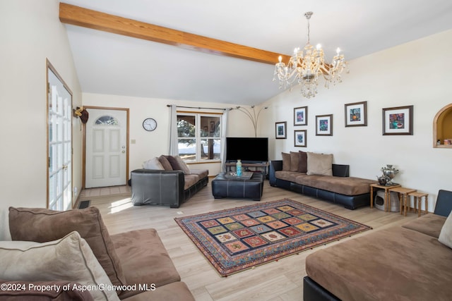 living room featuring vaulted ceiling with beams, a notable chandelier, and light hardwood / wood-style floors