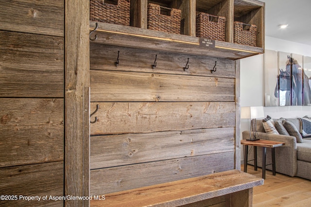 mudroom with hardwood / wood-style flooring