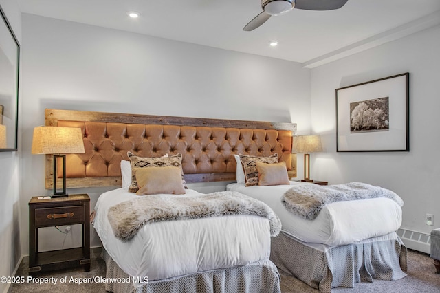 bedroom with ceiling fan and carpet floors