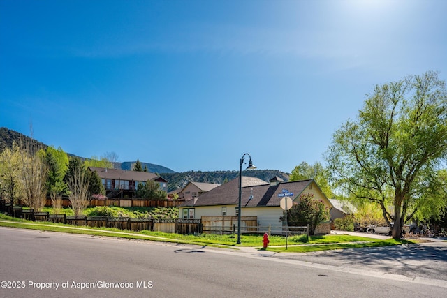 440 Stage Coach Ln, New Castle, CO 81647 - english style home with a residential view, a mountain view, and fence private yard