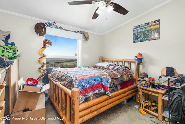 carpeted bedroom featuring ornamental molding, ceiling fan, and lofted ceiling