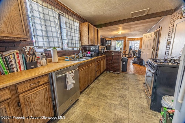 kitchen featuring stainless steel appliances and sink