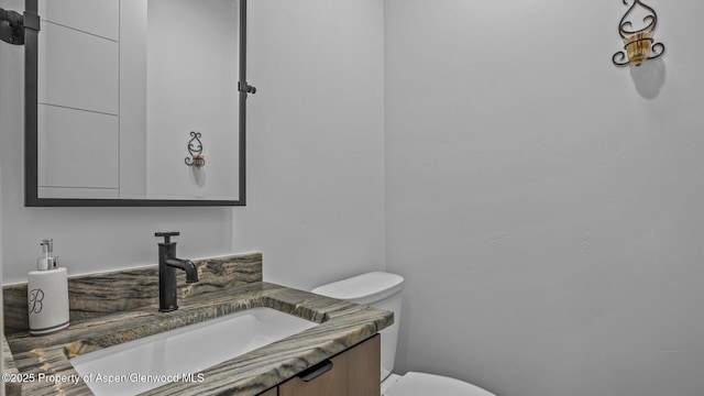 63 Meadow Creek Ct, Battlement Mesa, CO 81635 - half bathroom with toilet and vanity