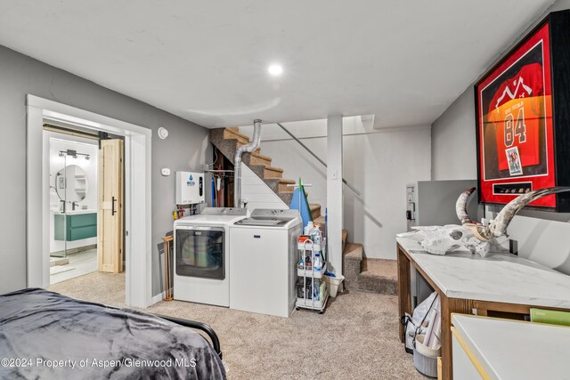 interior space featuring light carpet and independent washer and dryer