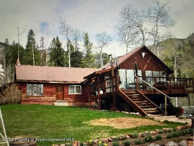 15405 Frying Pan Rd, Basalt, CO 81621 - back of house featuring stairs, a yard, and a deck