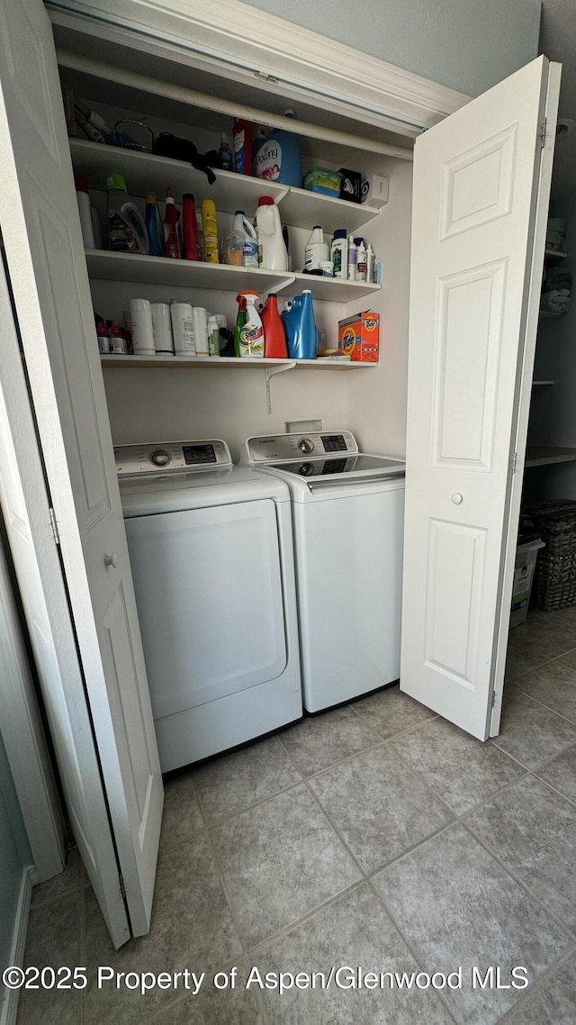 31 Hawthorne Way, Parachute, CO 81635 - laundry room featuring washer and clothes dryer, laundry area, and light tile patterned flooring