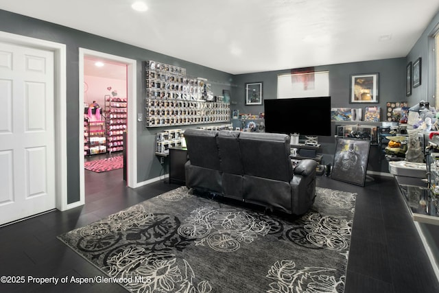 31 Hawthorne Way, Parachute, CO 81635 - living area featuring recessed lighting, wood finished floors, a bar, and baseboards