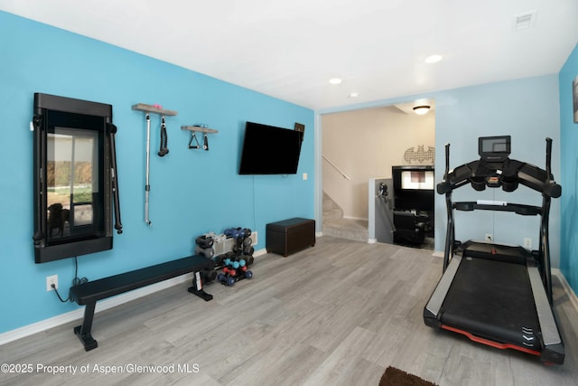 31 Hawthorne Way, Parachute, CO 81635 - exercise room with baseboards, wood finished floors, visible vents, and recessed lighting