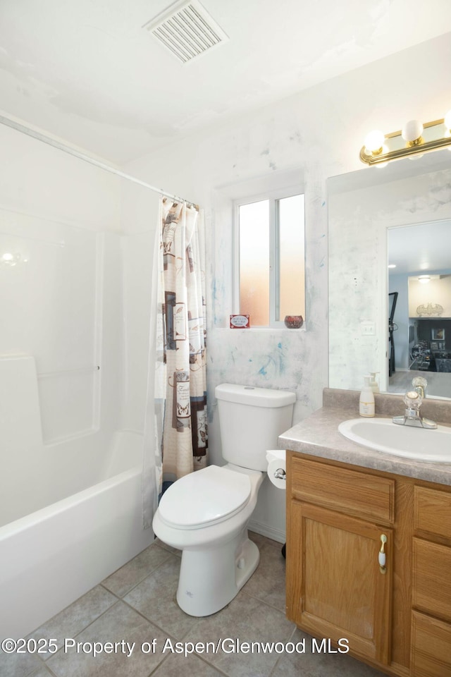 31 Hawthorne Way, Parachute, CO 81635 - ensuite bathroom featuring tile patterned floors, shower / bathtub combination with curtain, visible vents, toilet, and vanity