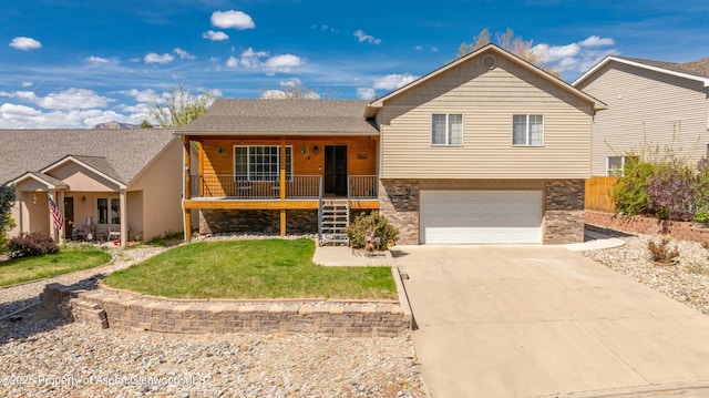 31 Hawthorne Way, Parachute, CO 81635 - view of front of home featuring stairway, driveway, a porch, brick siding, and a garage