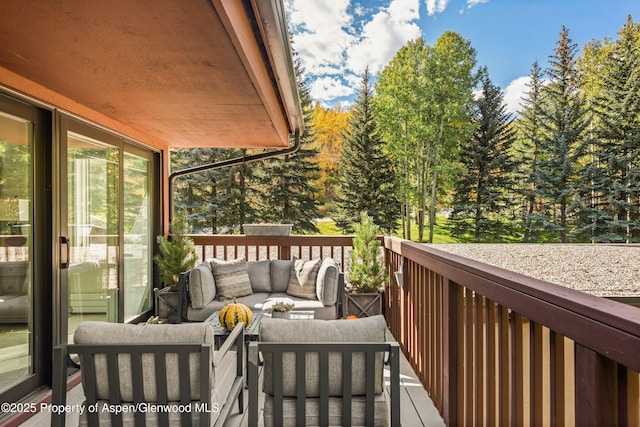 wooden deck with outdoor lounge area