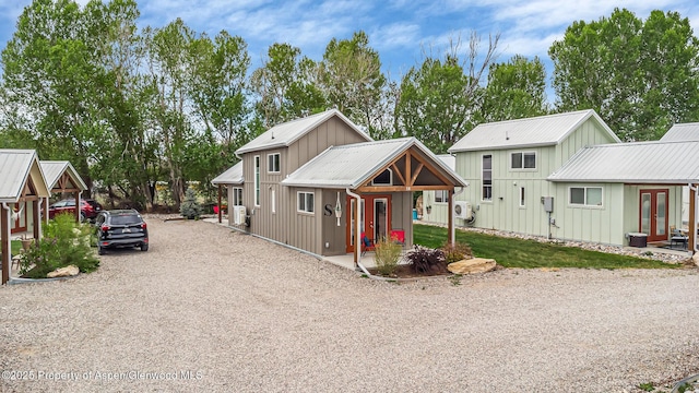 329 River Frontage Rd # 14, Silt, CO 81652 - view of front of home featuring gravel driveway and french doors