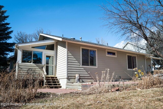 view of front of home with entry steps