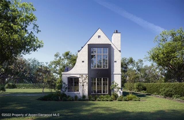 view of front facade with a front yard