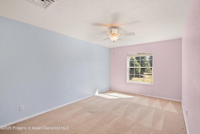 721 Pine Ct, New Castle, CO 81647 - empty room featuring baseboards, carpet flooring, ceiling fan, and visible vents