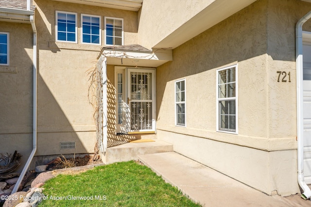 721 Pine Ct, New Castle, CO 81647 - property entrance featuring stucco siding