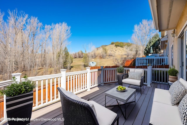 721 Pine Ct, New Castle, CO 81647 - wooden terrace with a mountain view
