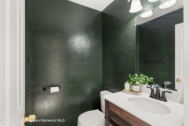 721 Pine Ct, New Castle, CO 81647 - bathroom featuring toilet and vanity