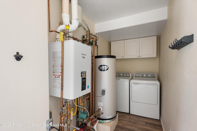 721 Pine Ct, New Castle, CO 81647 - clothes washing area featuring tankless water heater, separate washer and dryer, electric water heater, cabinet space, and dark wood-type flooring
