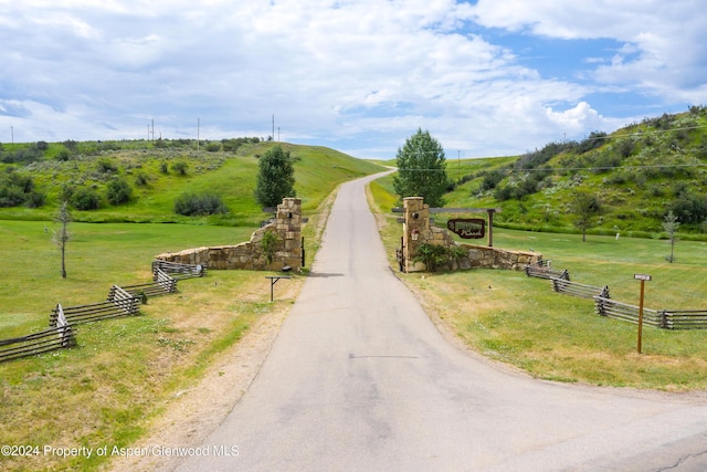 view of road featuring a rural view