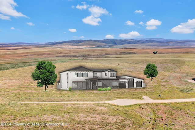 exterior space featuring a mountain view and a rural view