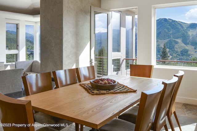 dining area with a mountain view