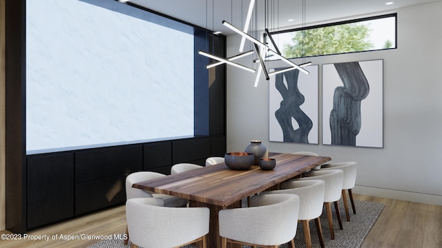 dining space featuring light wood-type flooring