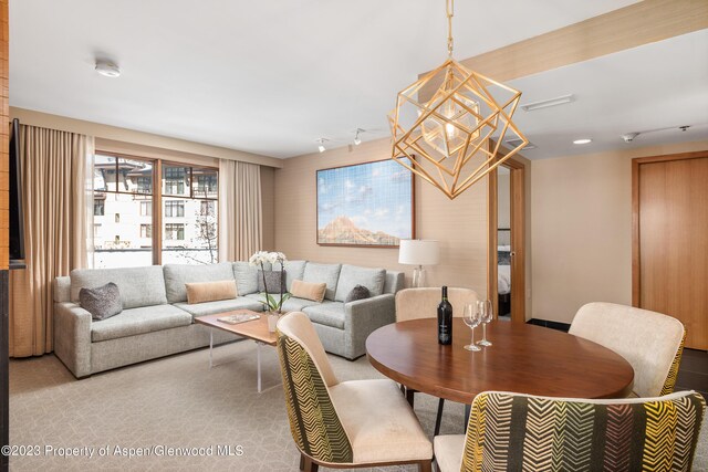 view of carpeted dining area