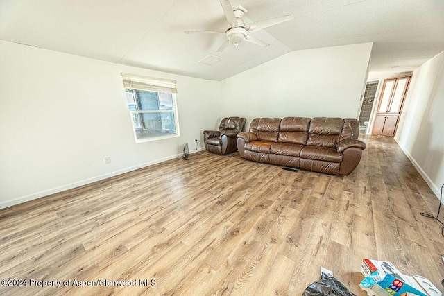261 Ellis Ave, Maybell, CO 81640 - living area featuring wood finished floors, ceiling fan, vaulted ceiling, and baseboards