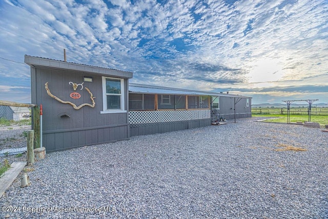261 Ellis Ave, Maybell, CO 81640 - view of home's exterior featuring fence