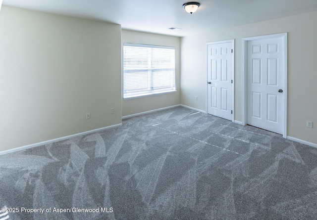 2449 Pine Ln, Rifle, CO 81650 - unfurnished bedroom with carpet floors and baseboards