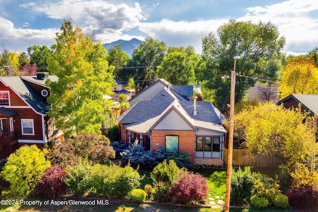 drone / aerial view featuring a mountain view