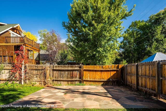 view of patio featuring a wooden deck