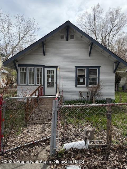 545 Taylor St, Craig, CO 81625 - view of front of home with fence private yard