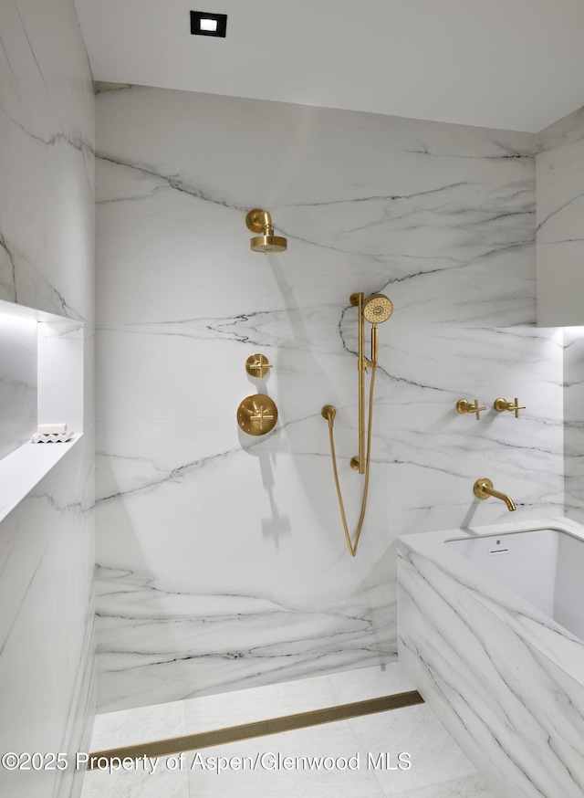 full bath with a tub with marble appearance and a marble finish shower