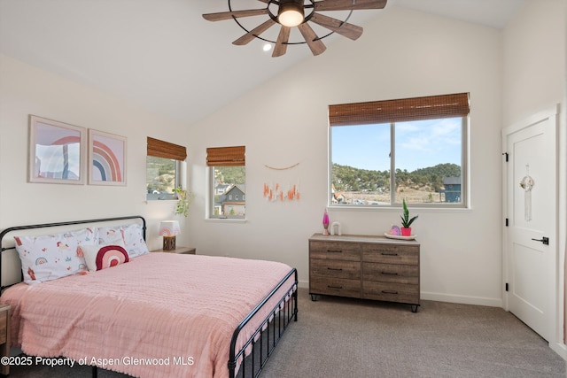 bedroom with baseboards, lofted ceiling, ceiling fan, and carpet flooring