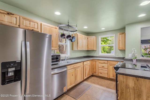 1114 Blake Ave, Glenwood Springs, CO 81601 - kitchen featuring stainless steel appliances, light brown cabinetry, dark countertops, and recessed lighting